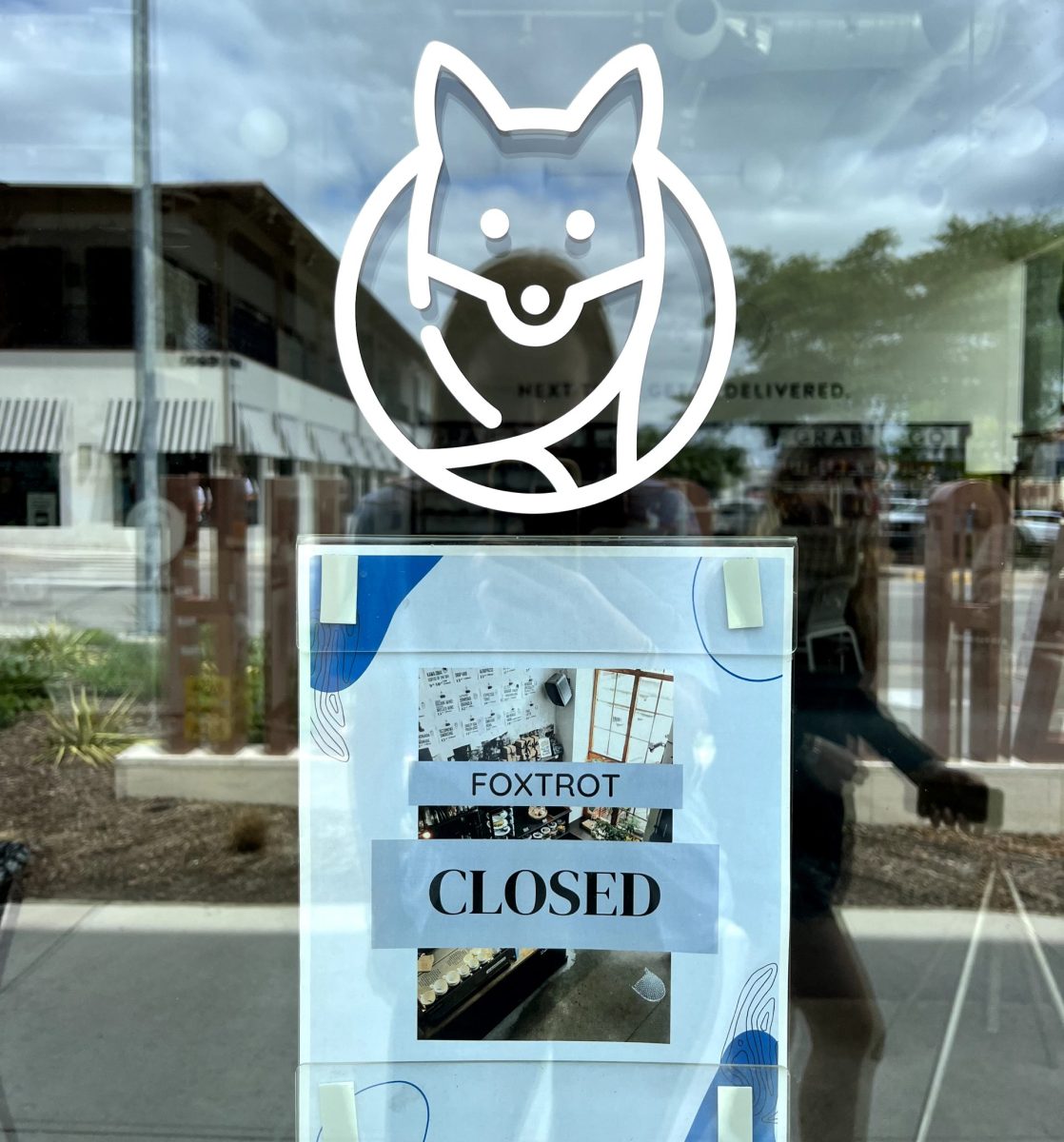 A closed sign appeared on the door of Foxtrot's Hillcrest location across from SMU at around 11 a.m. Tuesday morning.