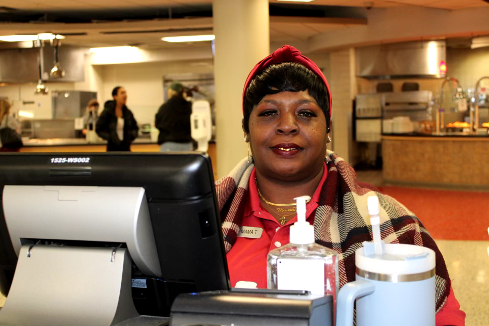 Tamerlyn Holmes, aka Mama T,  serves as a welcoming face in the Umphrey Lee Dinning Hall.