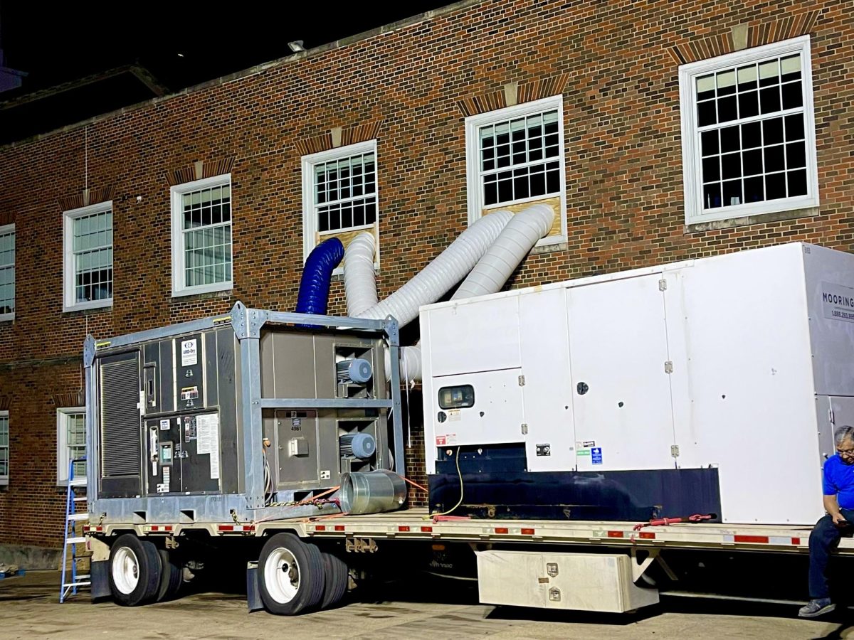 Machines placed outside of Umphrey Lee work around the clock to remove humidity from the building.