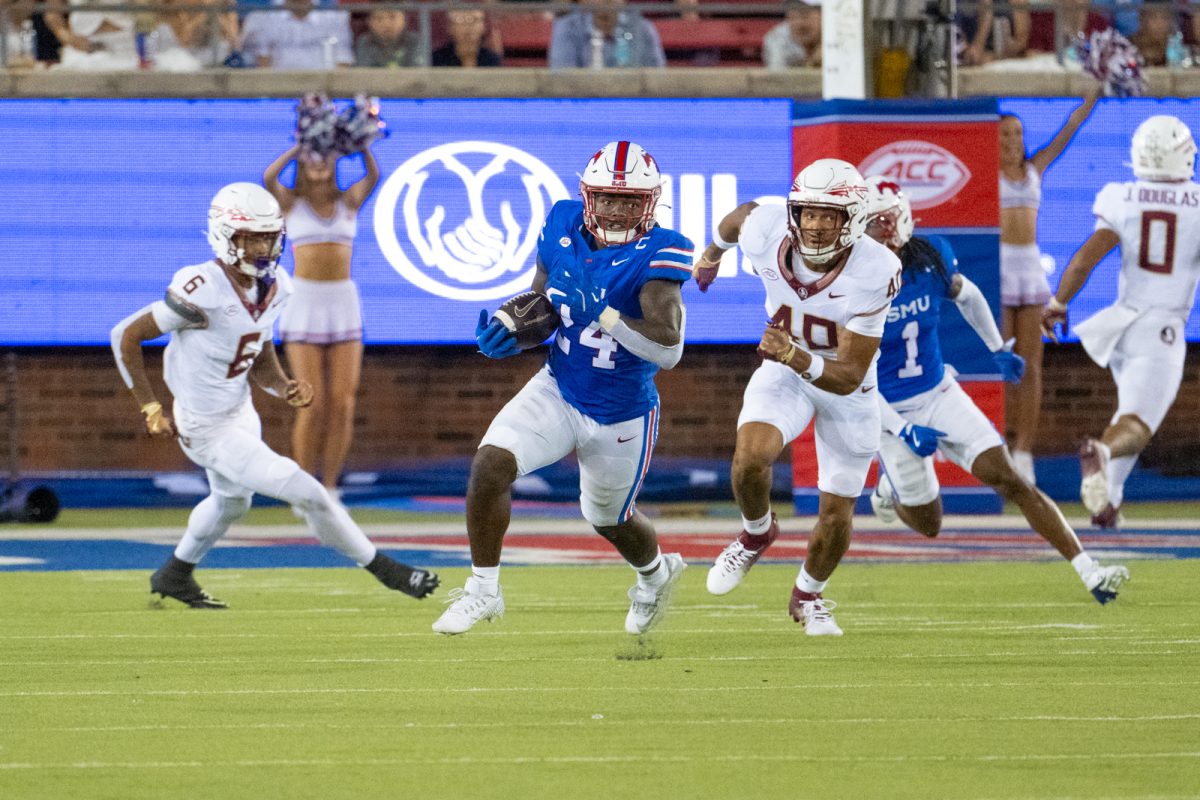 Kobe Wilson charges down the field in Ford Stadium for SMU's highly anticipated first ACC game. 