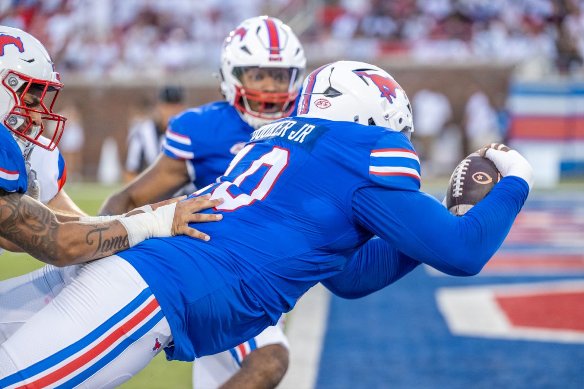 Anthony Booker Jr dives into the end zone to help deliver a win for SMU during their first home game of the season. 