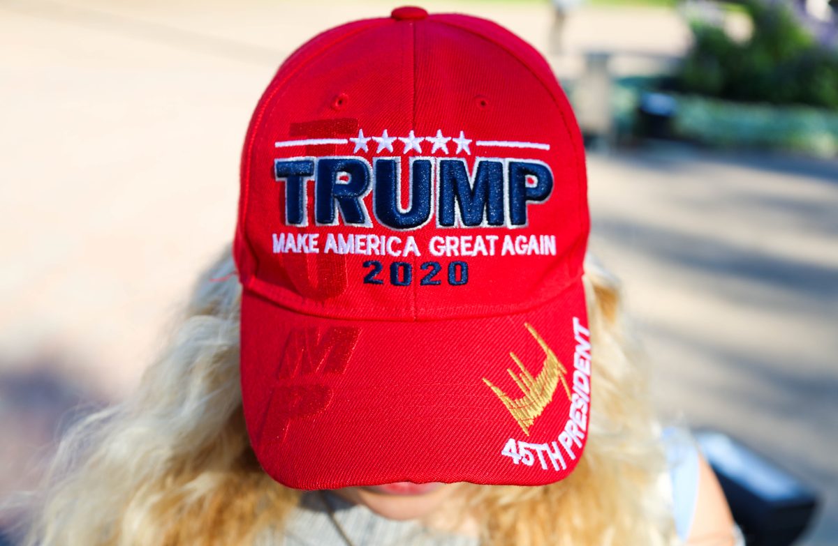 An SMU student is seen wearing a Trump hat on election day in Dallas, Texas, on Nov. 5, 2024