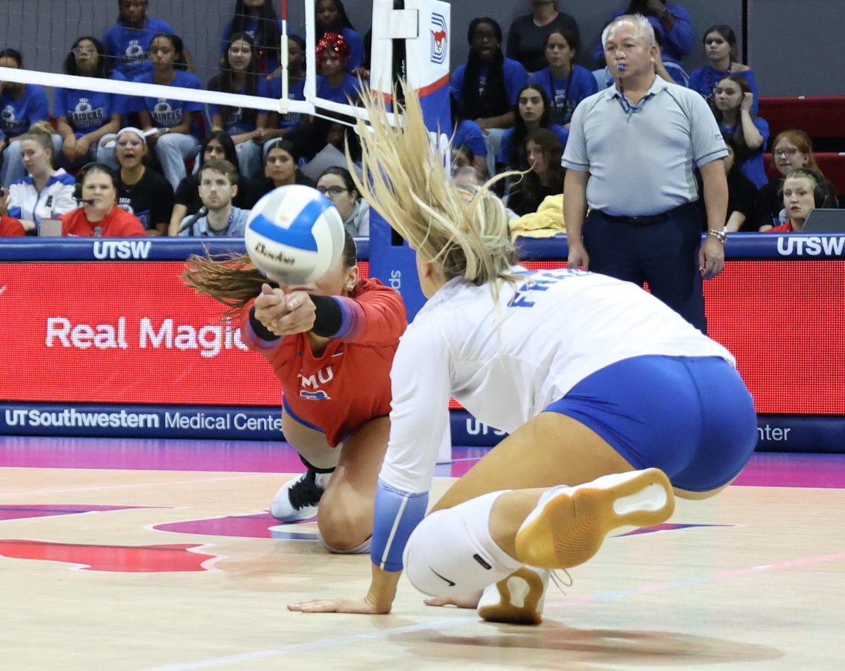 SMU plays dive for the ball in their match against Noter Dame in Dallas, Texas, on October 25, 2024