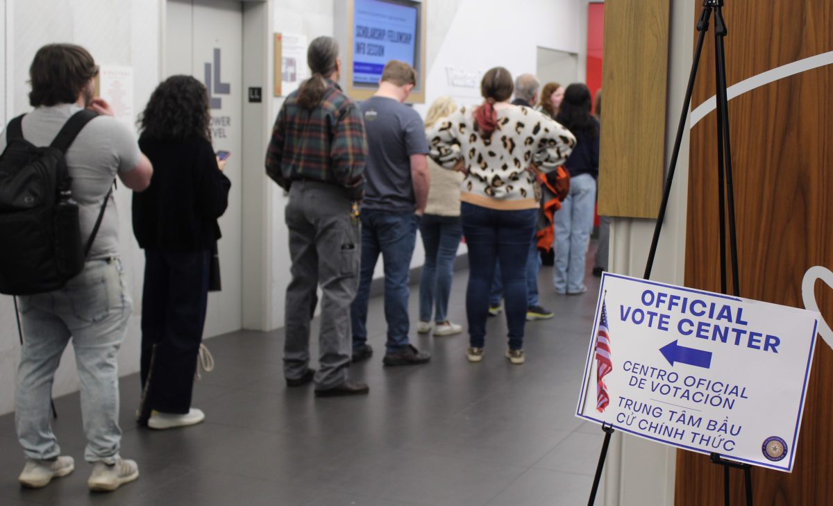 Voters line up outside Hughes Trigg Ball Room in anticipation of voting in the 2024 presidential election in Dallas, Texas, on Nov. 5, 2024