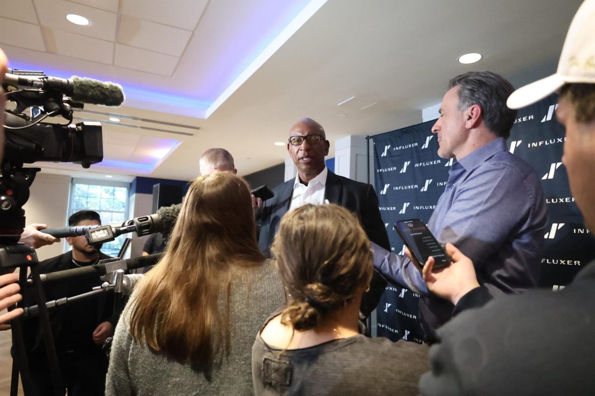 Eric Dickerson answers questions asked by reporters in the Armstrong Field House in Dallas, Texas, on December 3, 2024. 