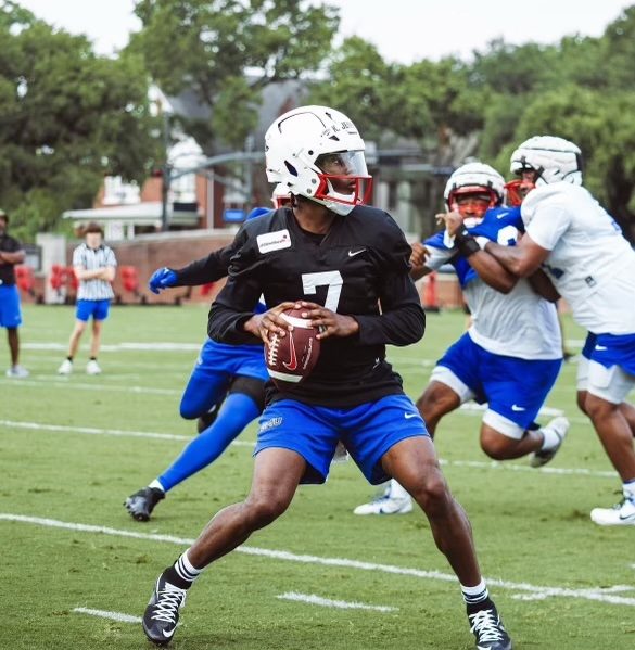 Kevin Jennings, 20, looks across the field to see which of his teammates are open for a pass during a recent practice.