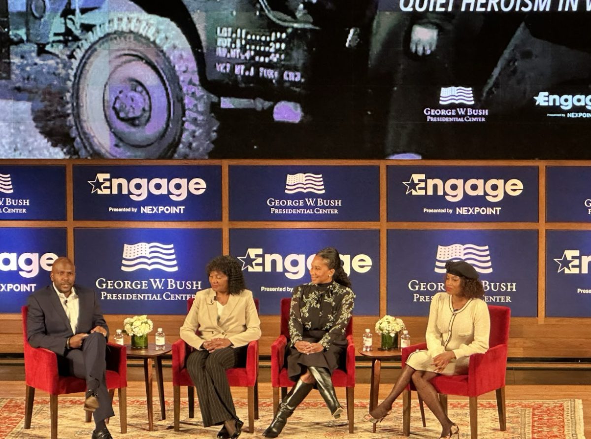 D’Juan Wilcher, Deputy Director of Veteran and Military Families at the George W. Bush Presidential Center, speaks with retired Army Col. Edna Cummins, Nicole Avant, and Milauna Jackson at the George W. Bush Presidential Center. 