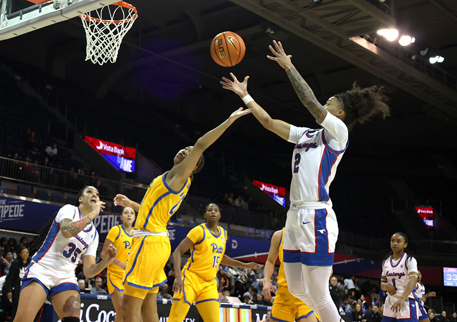 Junior guard TK Pitts jumps to catch the ball during a game against the Pittsburgh Panthers in Moody Coliseum. 