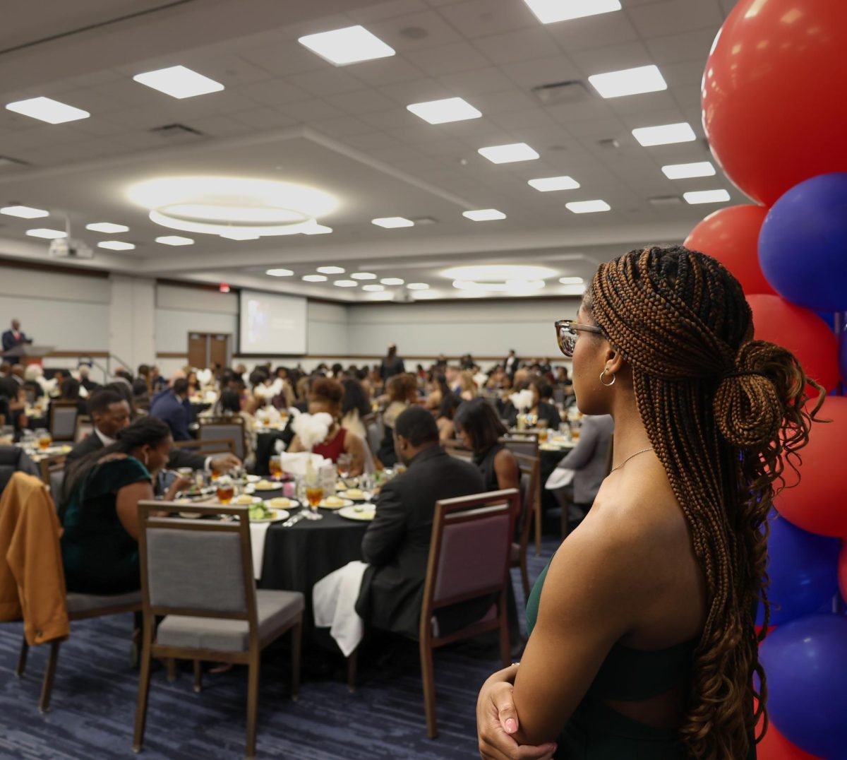 Ashley Jones, president of ABS, watches Huntley's keynote speech. 