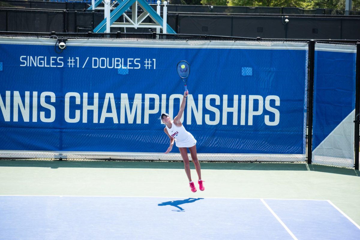 Sophie Llewelyn smashes a serve in the first round of the ACC Championships.