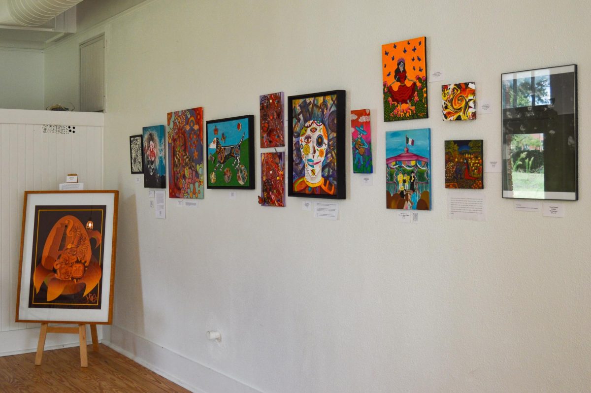(Far Left) "Fruta de mi Cultura" displayed alongside a wall featuring multiple artists.