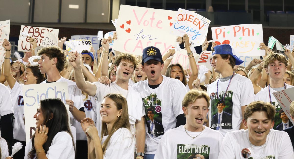 Members of Pi Beta Phi and Sigma Chi cheer in support of their homecoming royalty candidates, Casey Ulehla and Noah Giesen, at Rock the Vote in Dallas, Texas, on Oct. 27, 2025. 