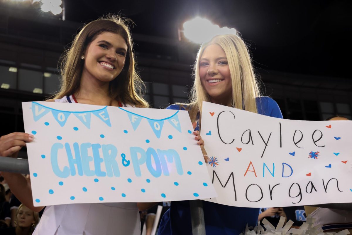 Members of SMU Spirit cheer in support of their homecoming royalty candidates, Caylee Props and Morgan Smith, at Rock the Vote in Dallas, Texas, on Oct. 27, 2025. 