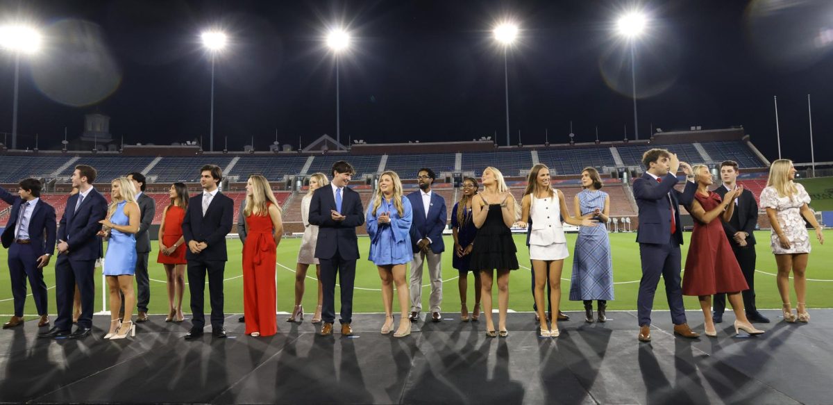 The candidates for SMU’s homecoming court stand on stage in front of their organizations' stage at Rock the Vote in Dallas, Texas, on Oct. 27, 2025.