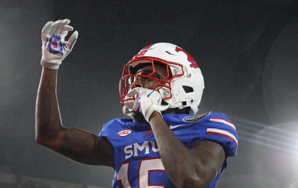 La’Modrick Spencer runs into the end zone after SMU regains possession against Arizona in the bowl game in San Diego, on Jan. 2, 2026. 