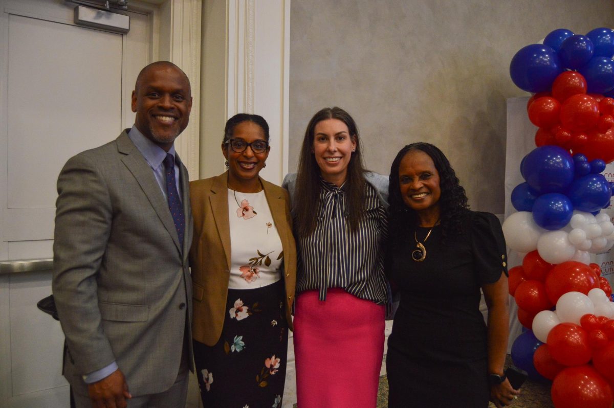 Provost Rachel Davis Mersey with faculty guests at the Martha Proctor Mack Grand Ballroom. (Photo by Edgar Palacios