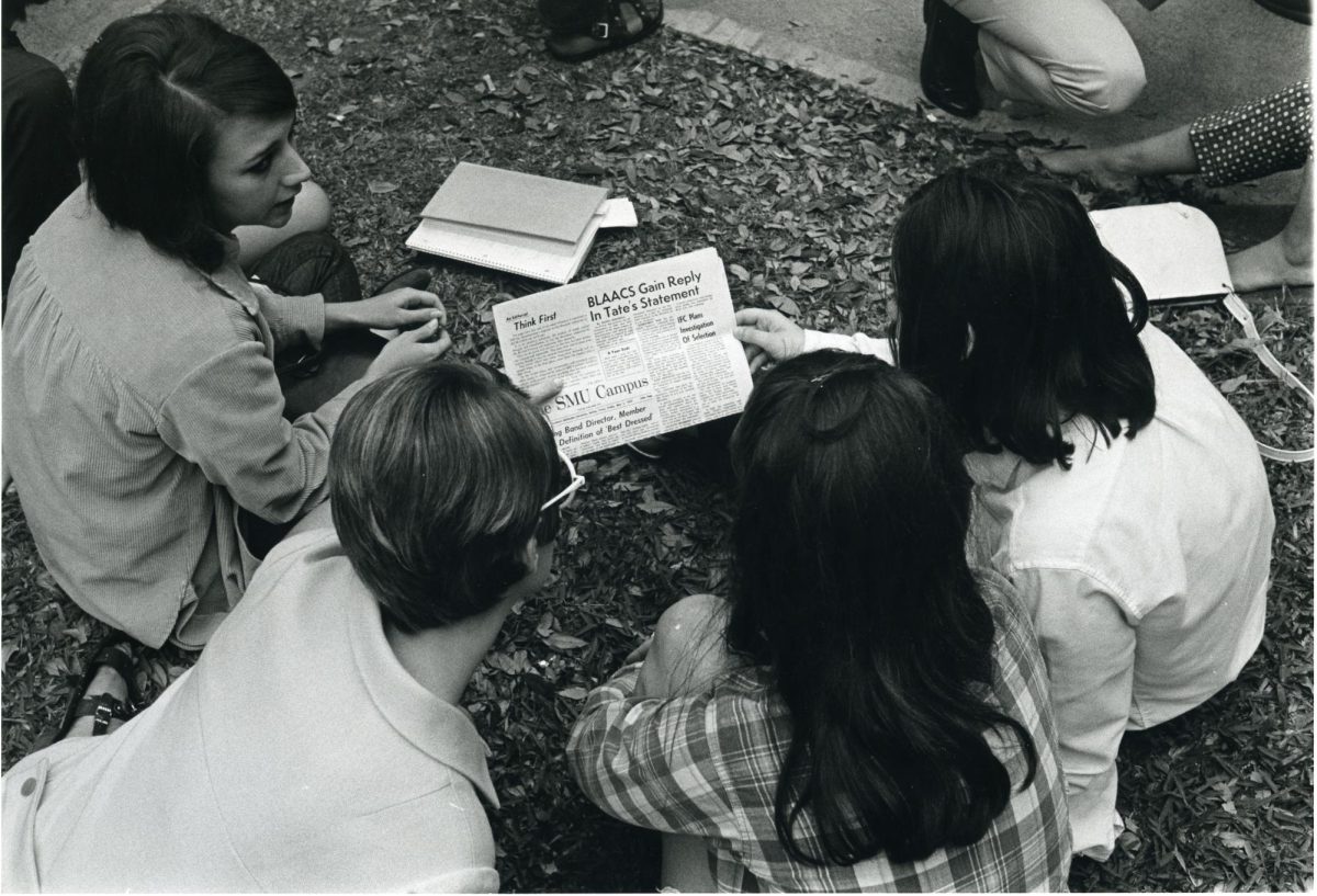 Students read about President Tate's response to the Black League of Afro-American and African College Students in 1969.